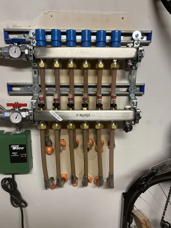 Plumber performing Gas Line Installation at a residential property in Four Bridges